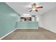 Open living room adjacent to kitchen, with neutral tones and a ceiling fan at 661 Tupelo Ln. # 16B, Longs, SC 29568