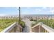 Wooden steps leading to the beach at 6900 N Ocean Blvd. # 1439, Myrtle Beach, SC 29572