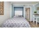 Cozy bedroom with a comfortable bed and ocean view at 6900 N Ocean Blvd. # 1439, Myrtle Beach, SC 29572
