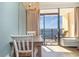 Bright dining area with ocean view and wooden table at 6900 N Ocean Blvd. # 1439, Myrtle Beach, SC 29572
