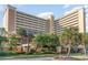 Resort hotel showcasing its architecture and landscaping at 6900 N Ocean Blvd. # 1439, Myrtle Beach, SC 29572