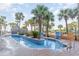 Relaxing lazy river pool with palm trees at 6900 N Ocean Blvd. # 1439, Myrtle Beach, SC 29572