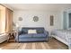 Cozy living room with blue couch and beach decor at 6900 N Ocean Blvd. # 1439, Myrtle Beach, SC 29572