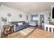 Open living area with couch, bed, and dining table at 6900 N Ocean Blvd. # 1439, Myrtle Beach, SC 29572