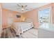 Bedroom with a queen bed and ceiling fan at 731 Yokley Ct., Surfside Beach, SC 29575