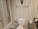 Clean bathroom with a shower/tub combo and granite vanity at 800 Egret Circle # 45, Little River, SC 29566
