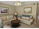 Spacious living room featuring comfortable sofas and a coffee table at 800 Egret Circle # 45, Little River, SC 29566