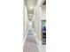 Elegant hallway with marble flooring and built-in bar at 9161 Bellasera Circle, Myrtle Beach, SC 29579