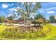 Entrance to Carolina Pines at Greenfields, landscaped with mature trees and plantings at 1025 Carolina Rd. # I-7, Conway, SC 29526