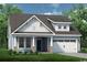 One-story home with light blue siding, brick accents, and a two-car garage at 135 Little Cedar Dr., Loris, SC 29569