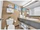 Clean bathroom with granite vanity and ample towels at 1501 S Ocean Blvd. # 321, Myrtle Beach, SC 29577