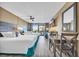 Two beds, a small desk, and balcony access at 1501 S Ocean Blvd. # 321, Myrtle Beach, SC 29577