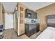 Small kitchenette with microwave, sink, and mini-fridge at 1501 S Ocean Blvd. # 321, Myrtle Beach, SC 29577