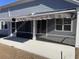 Home featuring a screened-in porch and awnings, providing a comfortable outdoor living space at 1519 Wood Stork Dr., Conway, SC 29526