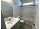 Bright bathroom with a single sink vanity, white countertops, and a shower-tub combination with tiled walls at 1519 Wood Stork Dr., Conway, SC 29526