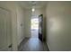 Bright entryway with wood-look floors and a clear view to the front door at 1519 Wood Stork Dr., Conway, SC 29526
