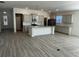 Stylish kitchen featuring gray cabinets, granite countertops, stainless appliances, and an island sink at 1519 Wood Stork Dr., Conway, SC 29526