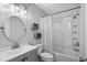 Bathroom with gray vanity, white tub, and shower at 1600 Gibson Ave., Myrtle Beach, SC 29575