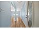 Bright entryway with light blue walls and hardwood floors at 1600 Gibson Ave., Myrtle Beach, SC 29575