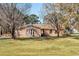Brick ranch house with a landscaped lawn at 1600 Gibson Ave., Myrtle Beach, SC 29575