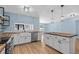 Bright kitchen with an island, stainless steel dishwasher, and light wood flooring at 1600 Gibson Ave., Myrtle Beach, SC 29575