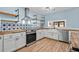 Newly renovated kitchen showcasing a farmhouse sink, wood countertops, and stylish tile at 1600 Gibson Ave., Myrtle Beach, SC 29575