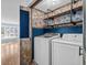 Laundry room with Samsung washer and dryer, and decorative shelves at 1600 Gibson Ave., Myrtle Beach, SC 29575