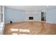Living room with hardwood floors and a whitewashed brick fireplace at 1600 Gibson Ave., Myrtle Beach, SC 29575