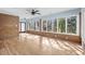 Bright sunroom with hardwood floors, brick walls, and sliding glass doors to the pool at 1600 Gibson Ave., Myrtle Beach, SC 29575