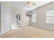 Bright bedroom with carpeting, ceiling fan, and private access to balcony at 171 Beaufain Ct., Pawleys Island, SC 29585