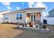 Private backyard with patio, grill, and landscaping at 191 Ocean Commons Dr., Surfside Beach, SC 29575