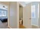 Small bathroom with toilet and adjacent bedroom at 191 Ocean Commons Dr., Surfside Beach, SC 29575