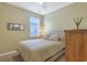 Bright bedroom with a comfortable bed and ample closet space at 191 Ocean Commons Dr., Surfside Beach, SC 29575