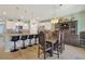 Elegant dining room with a large table and antique hutch at 191 Ocean Commons Dr., Surfside Beach, SC 29575