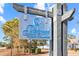Retreat at Ocean Commons entrance sign, modern design, blue lettering on brushed metal at 191 Ocean Commons Dr., Surfside Beach, SC 29575