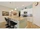 Modern kitchen with granite countertops and stainless steel appliances at 191 Ocean Commons Dr., Surfside Beach, SC 29575