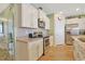 Clean and efficient kitchen with white cabinets and granite countertops at 191 Ocean Commons Dr., Surfside Beach, SC 29575