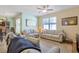 Bright and airy living room with comfortable sofas and large windows at 191 Ocean Commons Dr., Surfside Beach, SC 29575