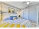 Bright bedroom with a king-size bed and coastal decor at 1990 N Waccamaw Dr. # 1109, Garden City Beach, SC 29576