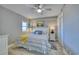 Comfortable bedroom with king-size bed and ocean-themed art at 1990 N Waccamaw Dr. # 1109, Garden City Beach, SC 29576