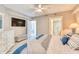 Bedroom with TV, dresser, and ensuite bathroom at 1990 N Waccamaw Dr. # 1109, Garden City Beach, SC 29576