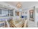 Bright dining area with glass-top table and seating for four at 1990 N Waccamaw Dr. # 1109, Garden City Beach, SC 29576