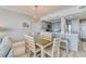 Modern kitchen with breakfast bar and dining area at 1990 N Waccamaw Dr. # 1109, Garden City Beach, SC 29576