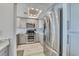 Stainless steel appliances and gray cabinets in this modern kitchen at 1990 N Waccamaw Dr. # 1109, Garden City Beach, SC 29576