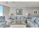 Living area with ocean view and comfortable seating at 1990 N Waccamaw Dr. # 1109, Garden City Beach, SC 29576