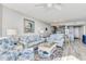 Living room with comfortable seating and ocean view at 1990 N Waccamaw Dr. # 1109, Garden City Beach, SC 29576