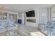 Living room with fireplace and built-in entertainment center at 1990 N Waccamaw Dr. # 1109, Garden City Beach, SC 29576