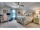 Cozy bedroom with neutral decor, soft carpet, and natural light at 2004 Via Palma Dr., North Myrtle Beach, SC 29582