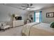 Comfortable bedroom features a soft carpet, ceiling fan and desk area at 2004 Via Palma Dr., North Myrtle Beach, SC 29582