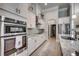 Well-equipped kitchen with stainless steel appliances, granite countertops, and ample cabinet space at 2004 Via Palma Dr., North Myrtle Beach, SC 29582